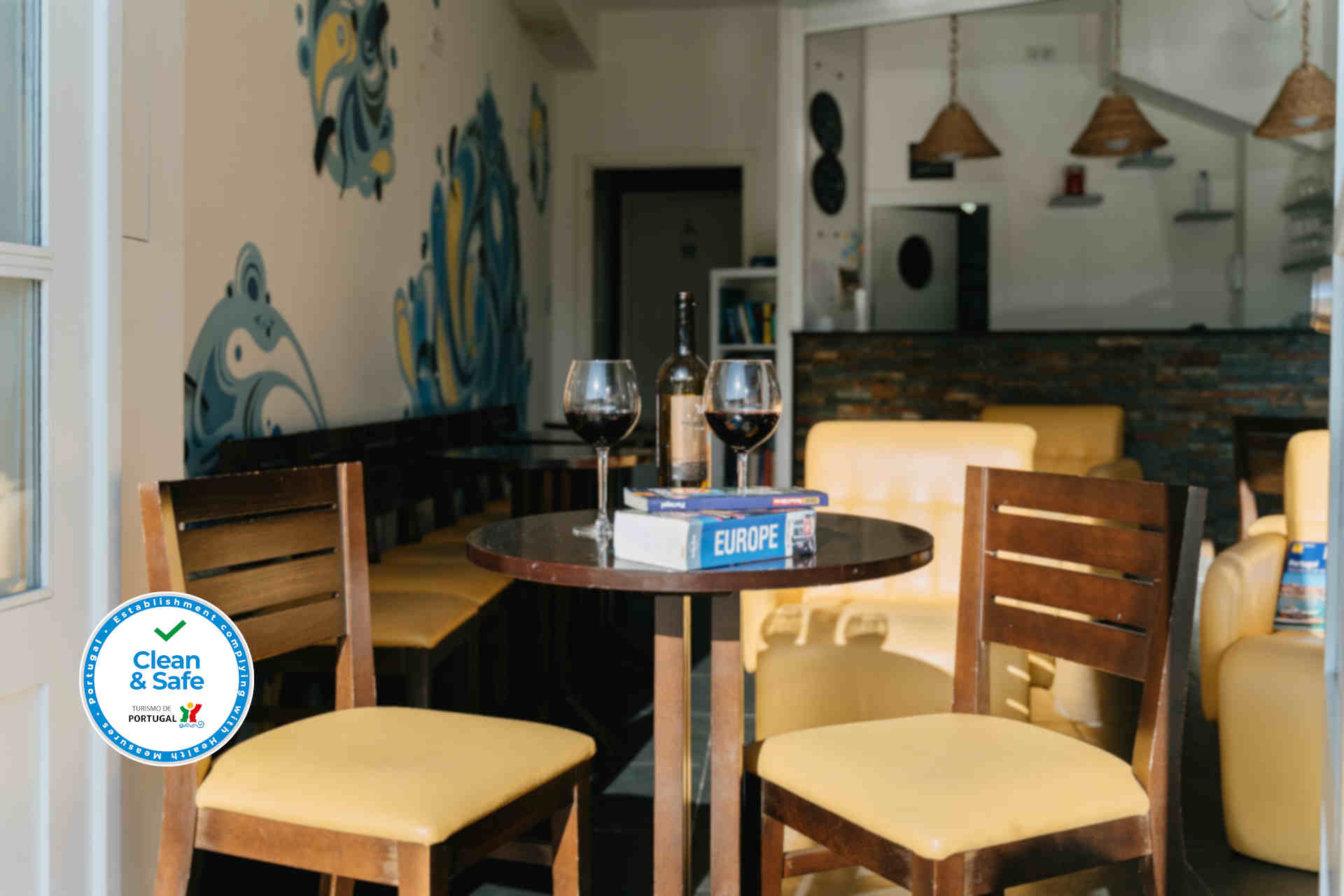 Common area bar inside Happy Porto Hostel for travellers